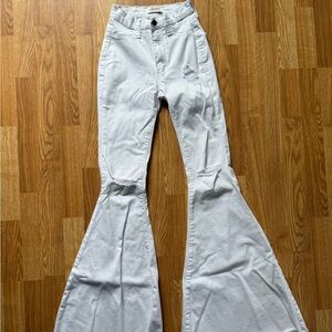 Vibrant MIU super flare distressed Denim Jeans